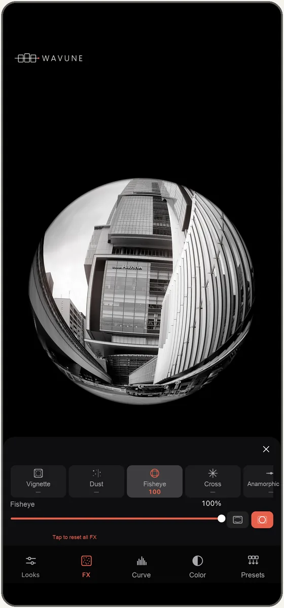 Shooting a photo with fisheye: a building curves into a round frame